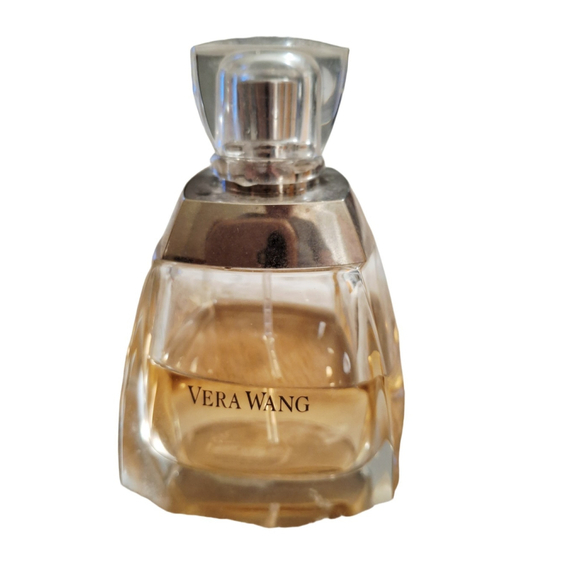 Vera Wang Accessories - Vera Wang eau de parfum spray 3.4 Oz Half Bottle
